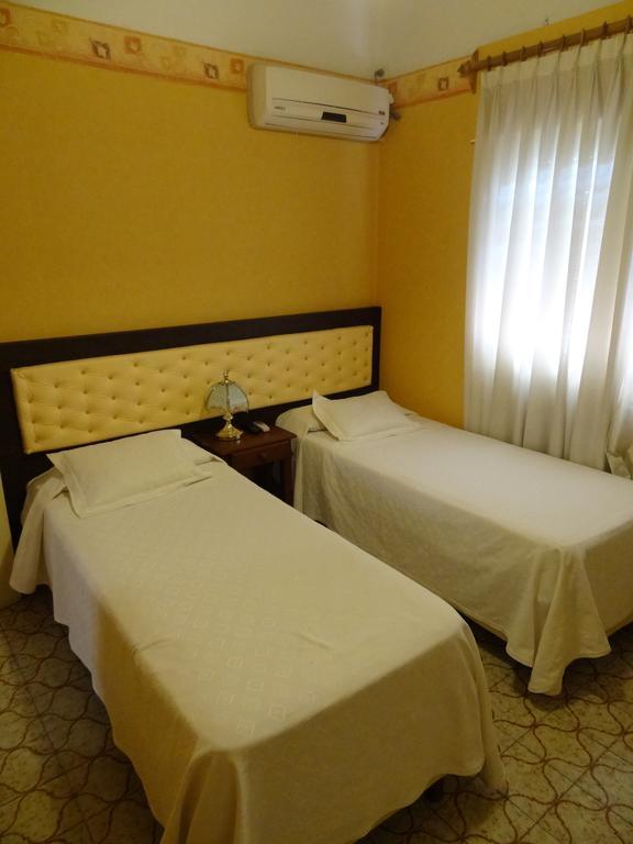 Mon Petit Hotel Villa Carlos Paz Kamer foto